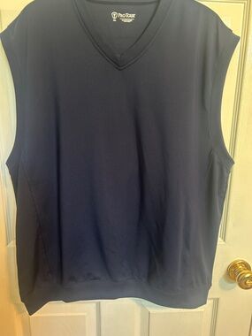 Men’s Pro Tour Performance Golf outerwear vest.